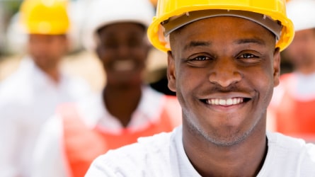 Construction worker smiling at the camera